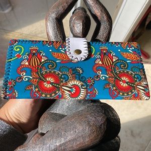 Bohemian wallet with Six credit cards on one side and four slots on the other